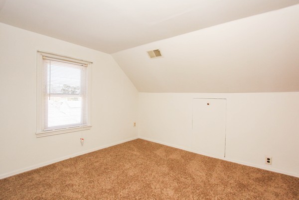 34 Surrey Road Springfield, MA 01118 - Photo 15 of 26 an empty room with a window
