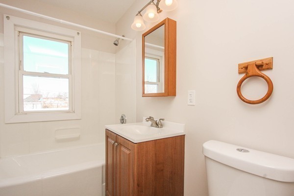 34 Surrey Road Springfield, MA 01118 - Photo 6 of 26 a bathroom with a sink a toilet and a bathtub