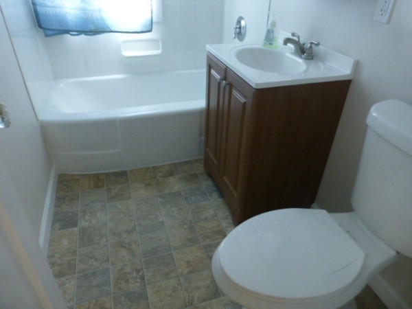 34 Surrey Road Springfield, MA 01118 - Photo 7 of 26 a bathroom with a sink toilet and shower