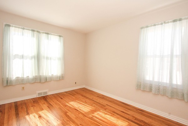 34 Surrey Road Springfield, MA 01118 - Photo 8 of 26 a view of an empty room and window