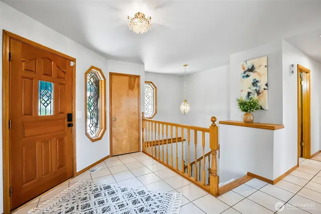 a view of entryway with a front door