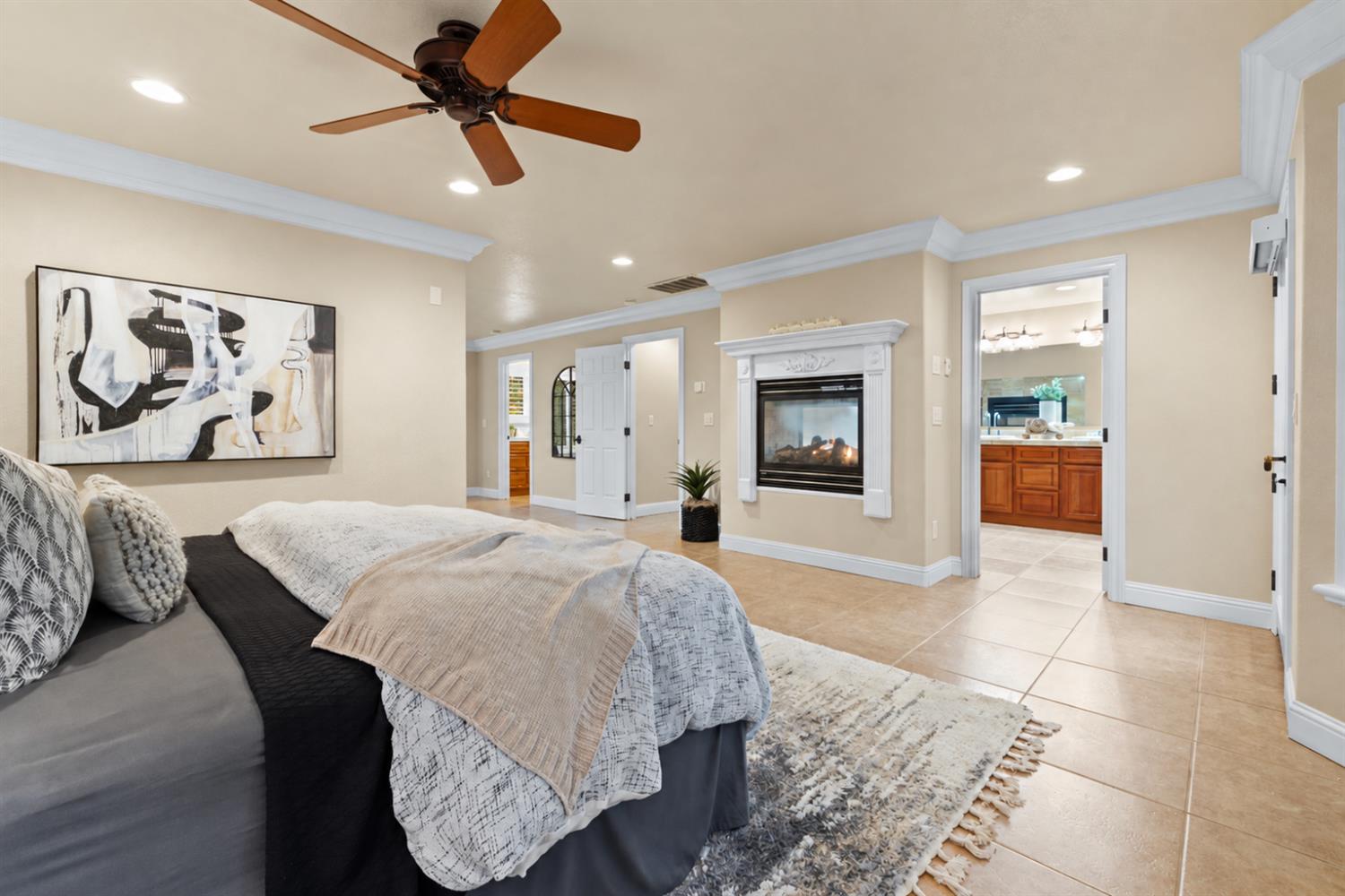 7396 Callison Road Penryn, CA 95663 - Photo 34 of 74 Cozy primary suite with gas fireplace and outdoor access