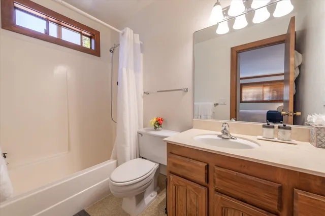 a view of house next to a yard