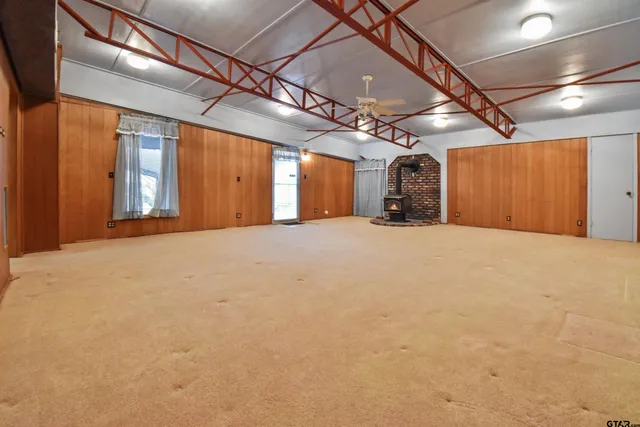 a view of a room with a car parked in it