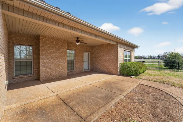 a view of outdoor space with deck and yard