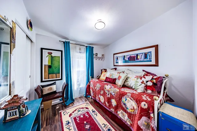 a dining room with furniture and entryway