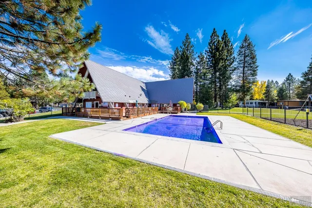 a view of a park with swings and slides