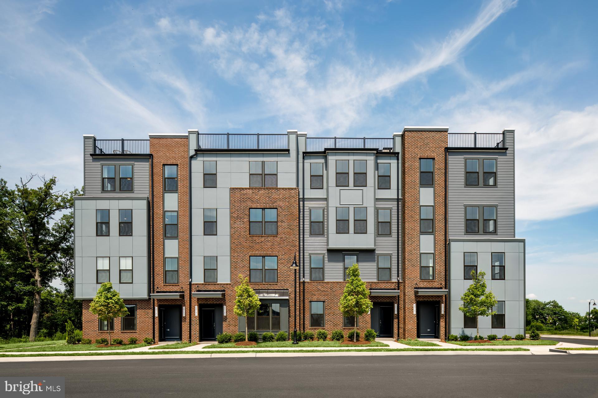 31 Rhapsody Terrace Ashburn, VA 20147 - Photo 2 of 8 front view of a building with a street