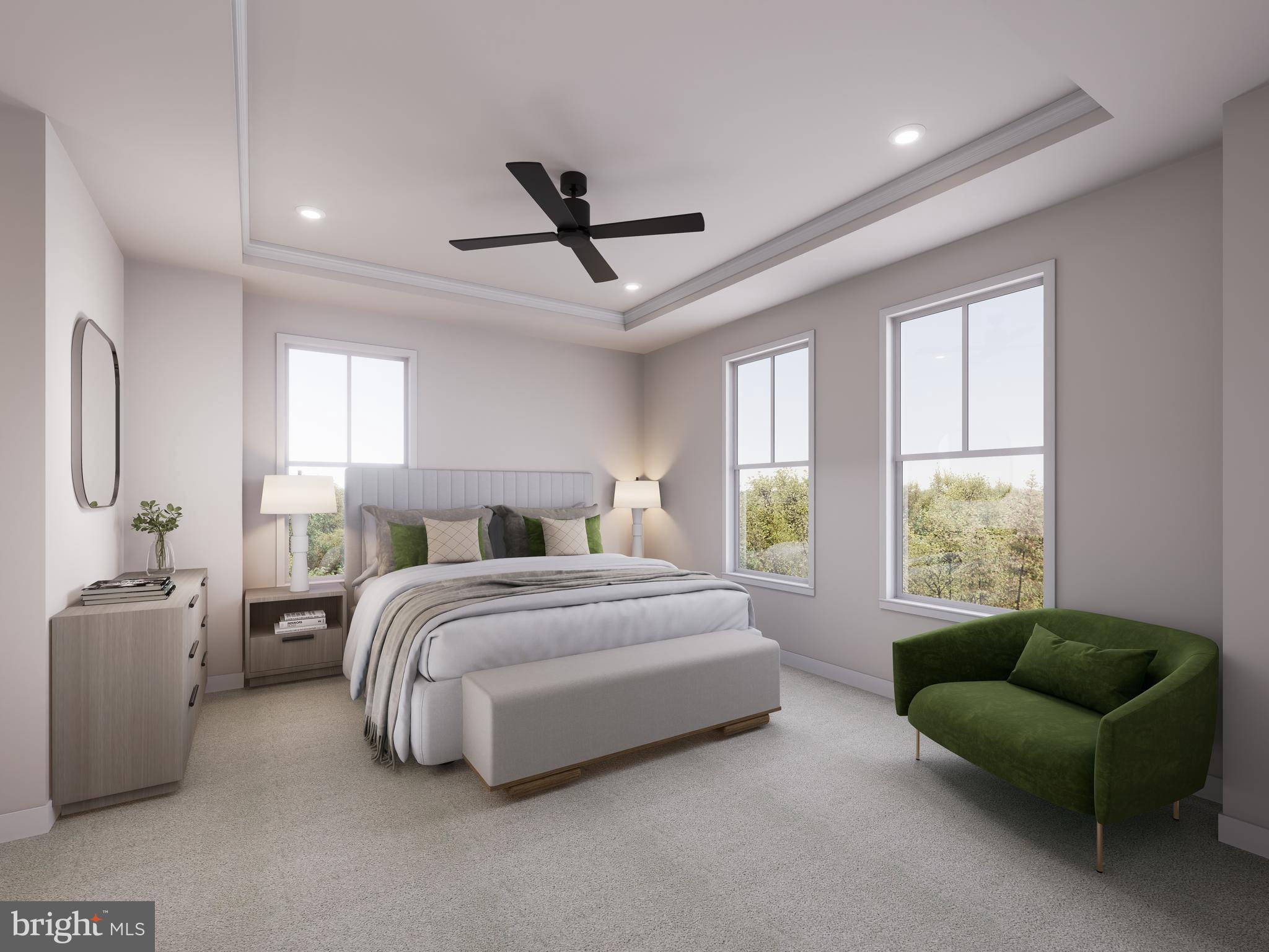 31 Rhapsody Terrace Ashburn, VA 20147 - Photo 6 of 8 a spacious bedroom with a bed and a couch