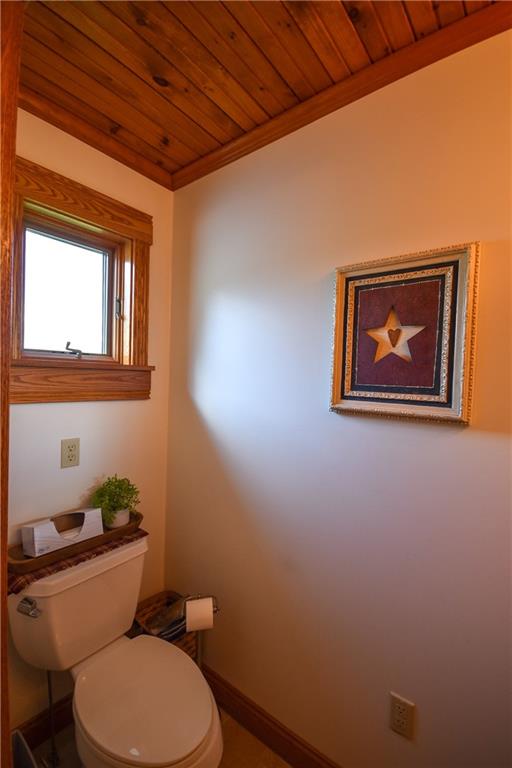 531 White Oak Road Rural Valley, PA 16249 - Photo 7 of 39 a bathroom with a toilet a sink and mirror