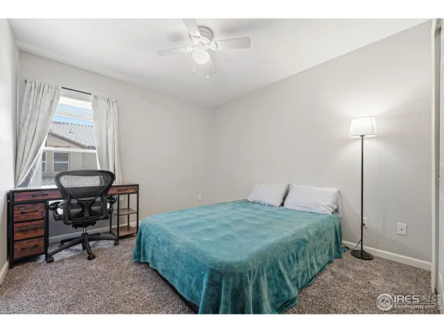 a bathroom with a tub a sink shower and mirror