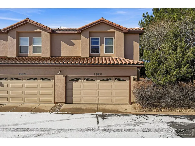 a view of a house with a garage