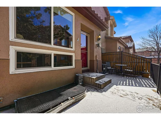 a view of backyard with a deck