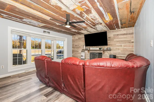 a kitchen with a table and chairs