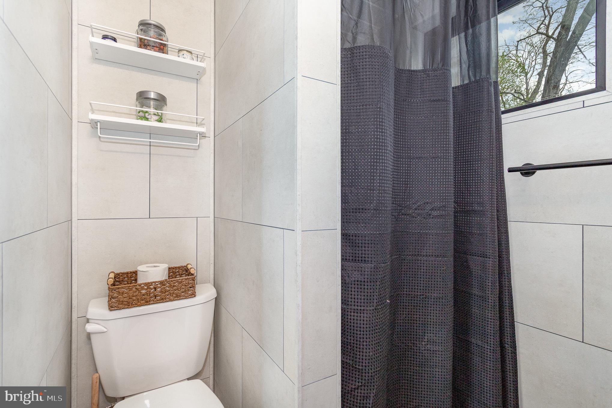 867 Schwanger Road, Unit 14 Elizabethtown, PA 17022 - Photo 11 of 25 a bathroom with a toilet and a sink