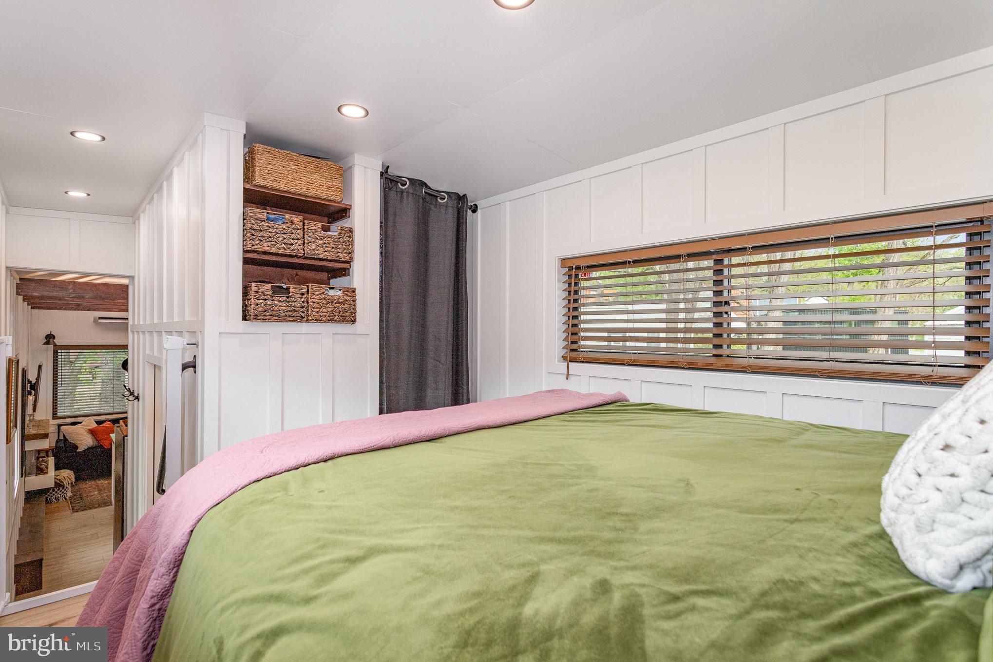 867 Schwanger Road, Unit 14 Elizabethtown, PA 17022 - Photo 14 of 25 a bed sitting in a spacious bedroom next to a window