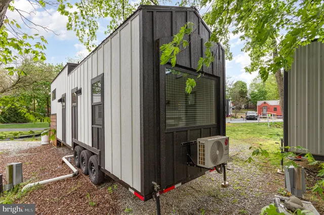 a backyard of a house with seating space
