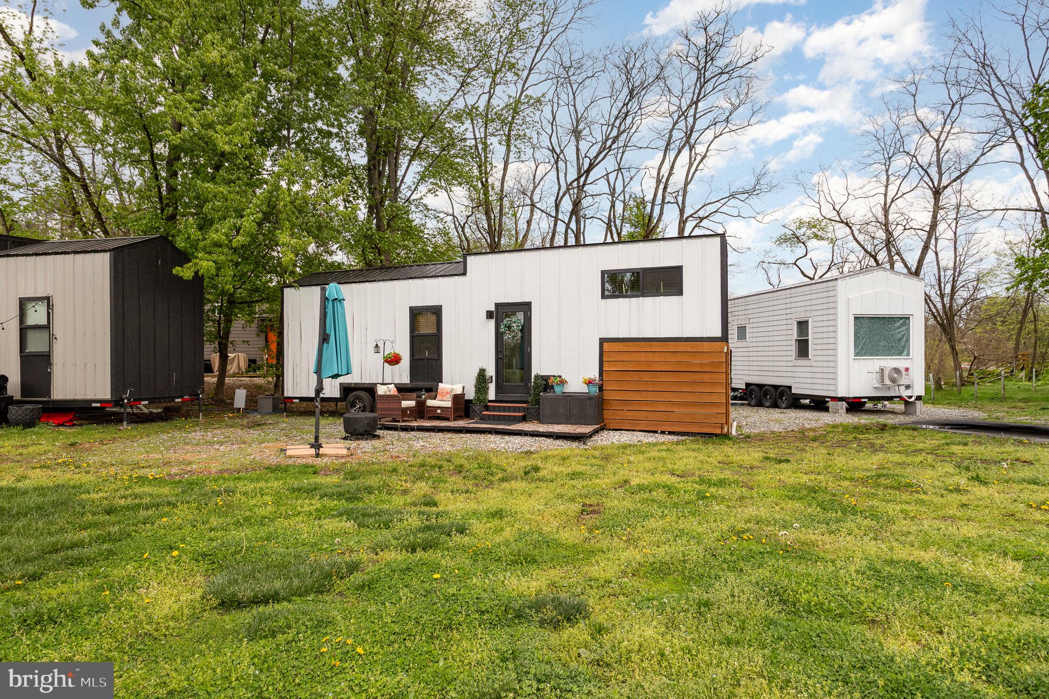 867 Schwanger Road, Unit 14 Elizabethtown, PA 17022 - Photo 18 of 25 a view of a house with backyard and a tree