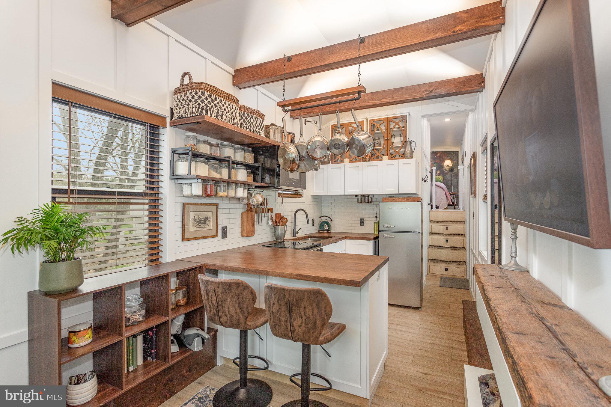 867 Schwanger Road, Unit 14 Elizabethtown, PA 17022 - Photo 2 of 25 a kitchen with stainless steel appliances granite countertop a stove and a refrigerator