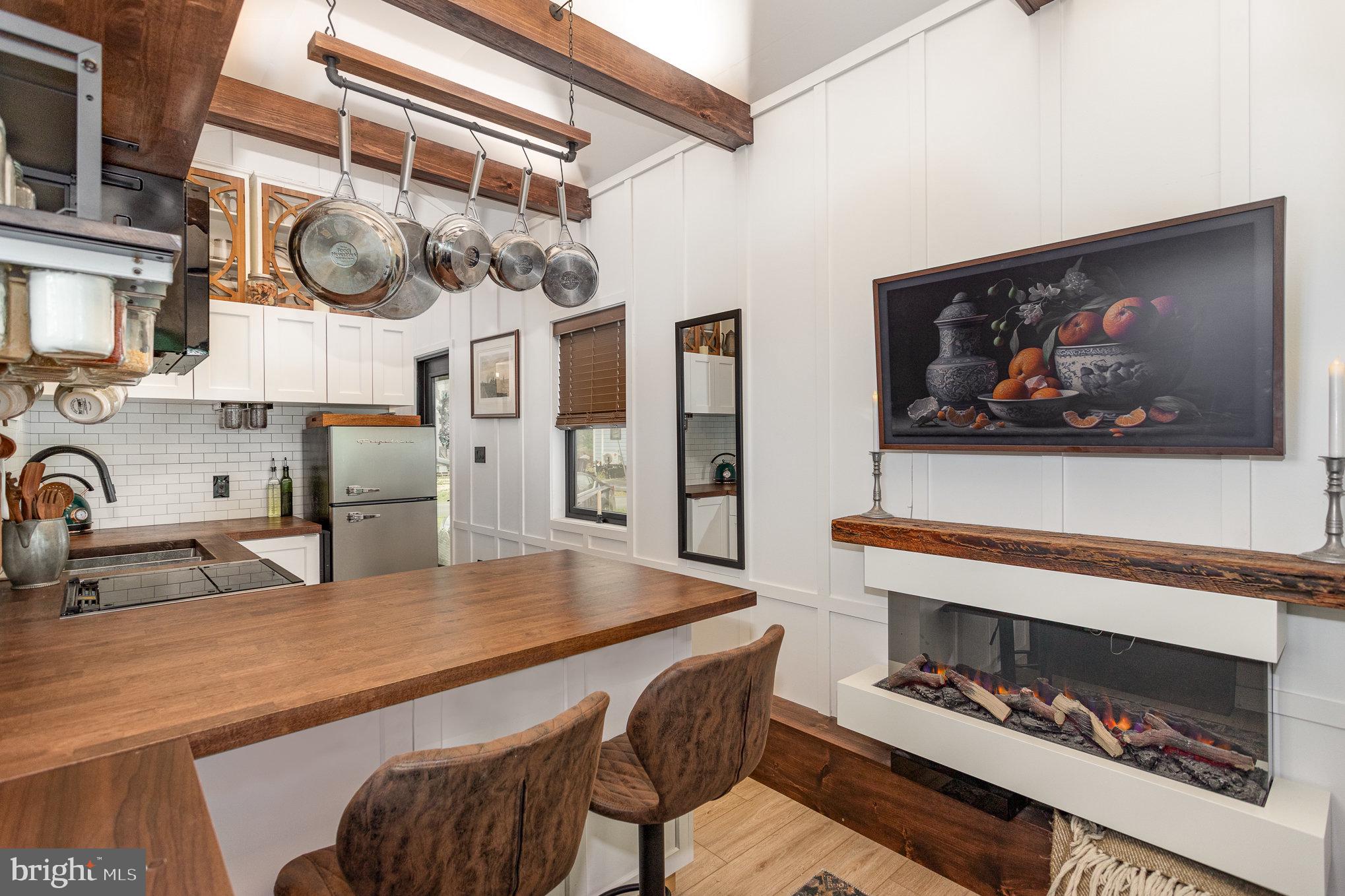 867 Schwanger Road, Unit 14 Elizabethtown, PA 17022 - Photo 3 of 25 a kitchen with stainless steel appliances kitchen island a stove a sink and a refrigerator