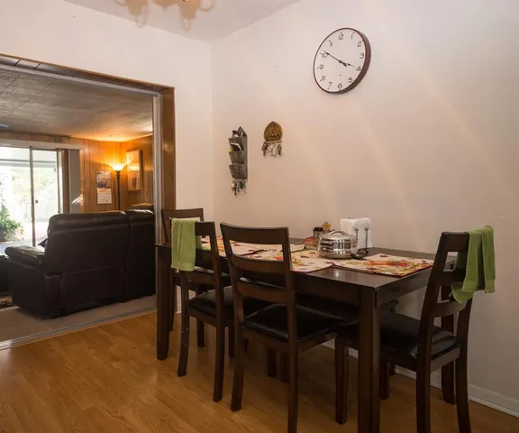 a view of a dining room with furniture