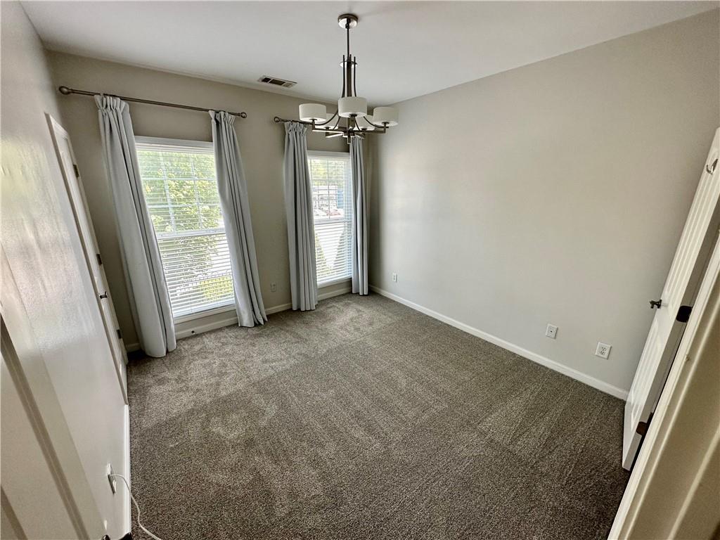 1615 Rivers Edge Trail Northeast Atlanta, GA 30324 - Photo 14 of 26 a view of a big room with windows and entryway