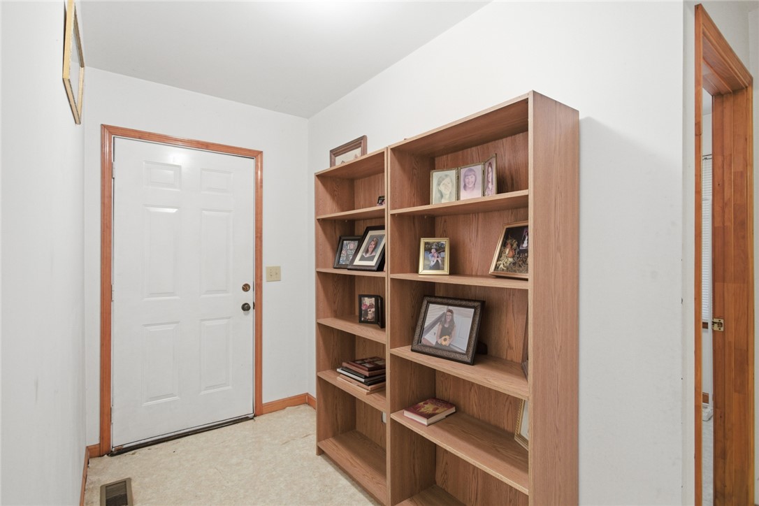 282 West Bennett Road Westminster, SC 29693 - Photo 23 of 42 This interior entryway features a functional design with accessible storage and a classic door.