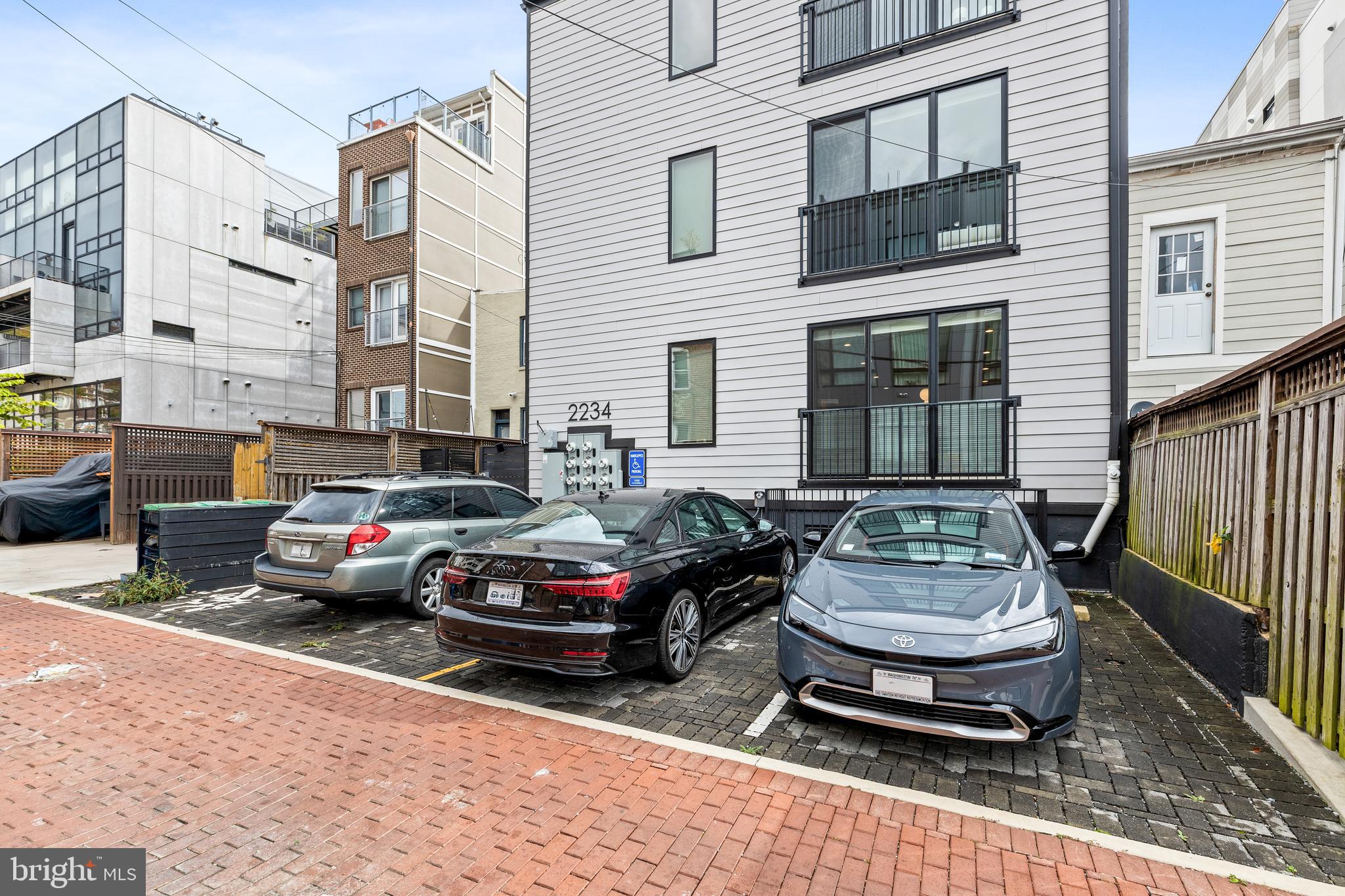 2234 11th Street Northwest, Unit 101 Washington, DC 20001 - Photo 23 of 25 a car parked in front of a house