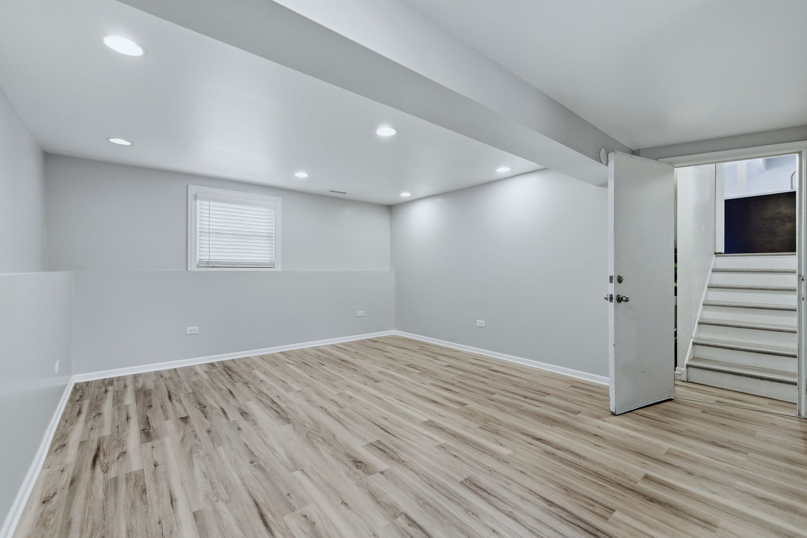 28-w032 Roosevelt Road Winfield, IL 60190 - Photo 18 of 35 wooden floor in an empty room with a window