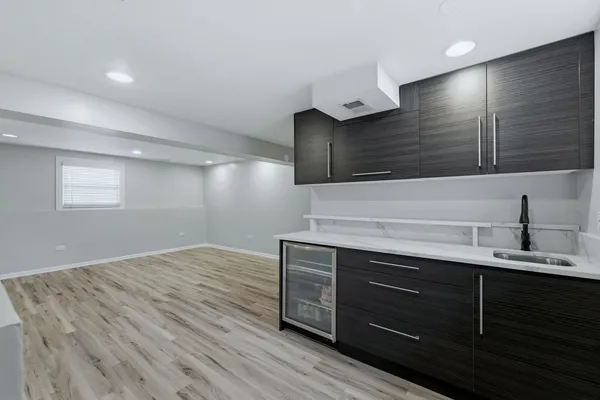 a view of cabinets and wooden floor