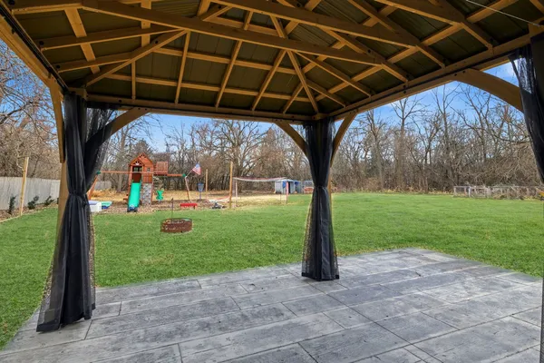a view of a porch with a backyard