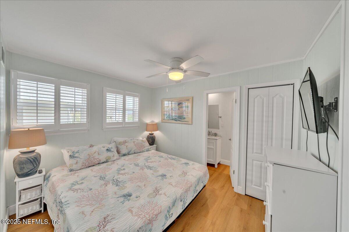 4491 Surfside Lane Port St. Joe, FL 32456 - Photo 12 of 84 a spacious bedroom with a bed and a window