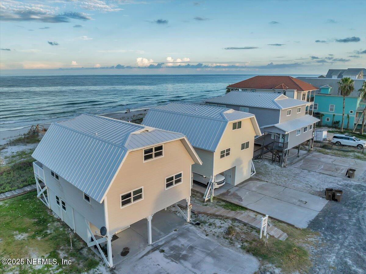 4491 Surfside Lane Port St. Joe, FL 32456 - Photo 2 of 84 an aerial view of a house with outdoor space
