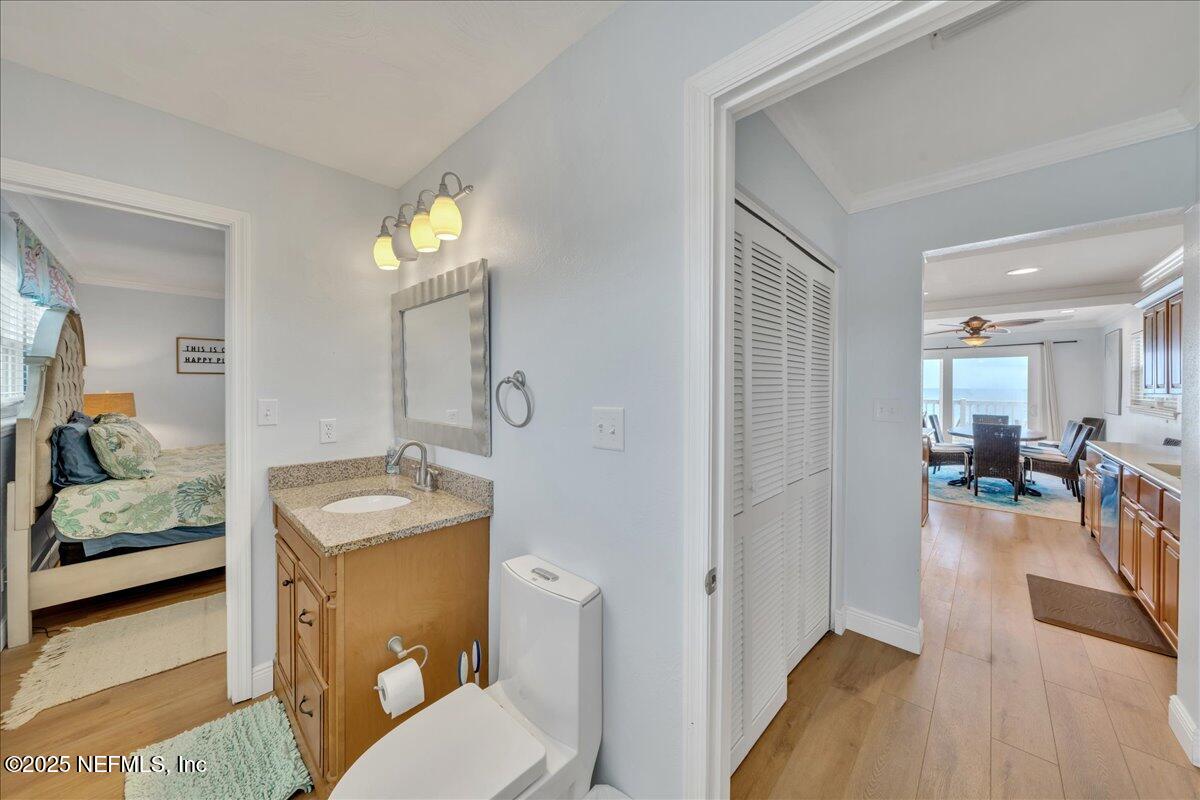 4491 Surfside Lane Port St. Joe, FL 32456 - Photo 25 of 84 a en suite bathroom with a toilet sink and mirror