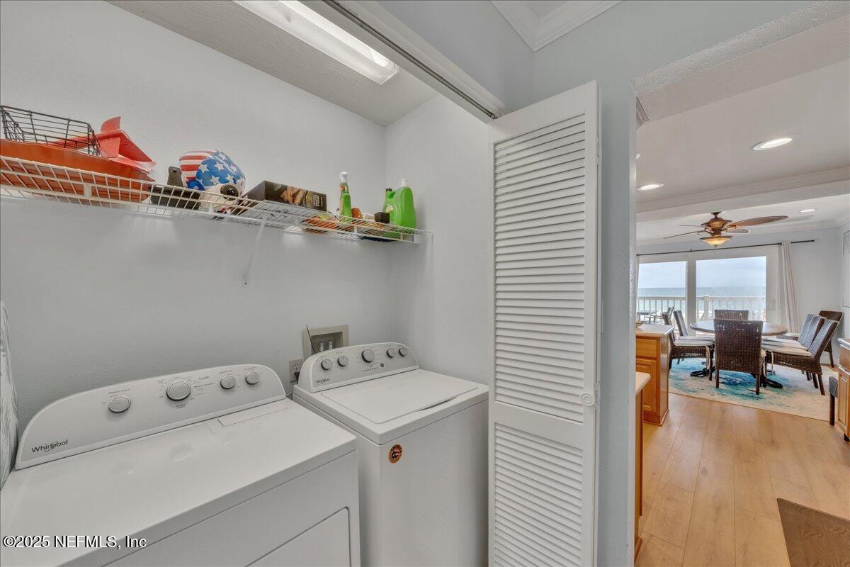 4491 Surfside Lane Port St. Joe, FL 32456 - Photo 26 of 84 a utility room with dryer and washer