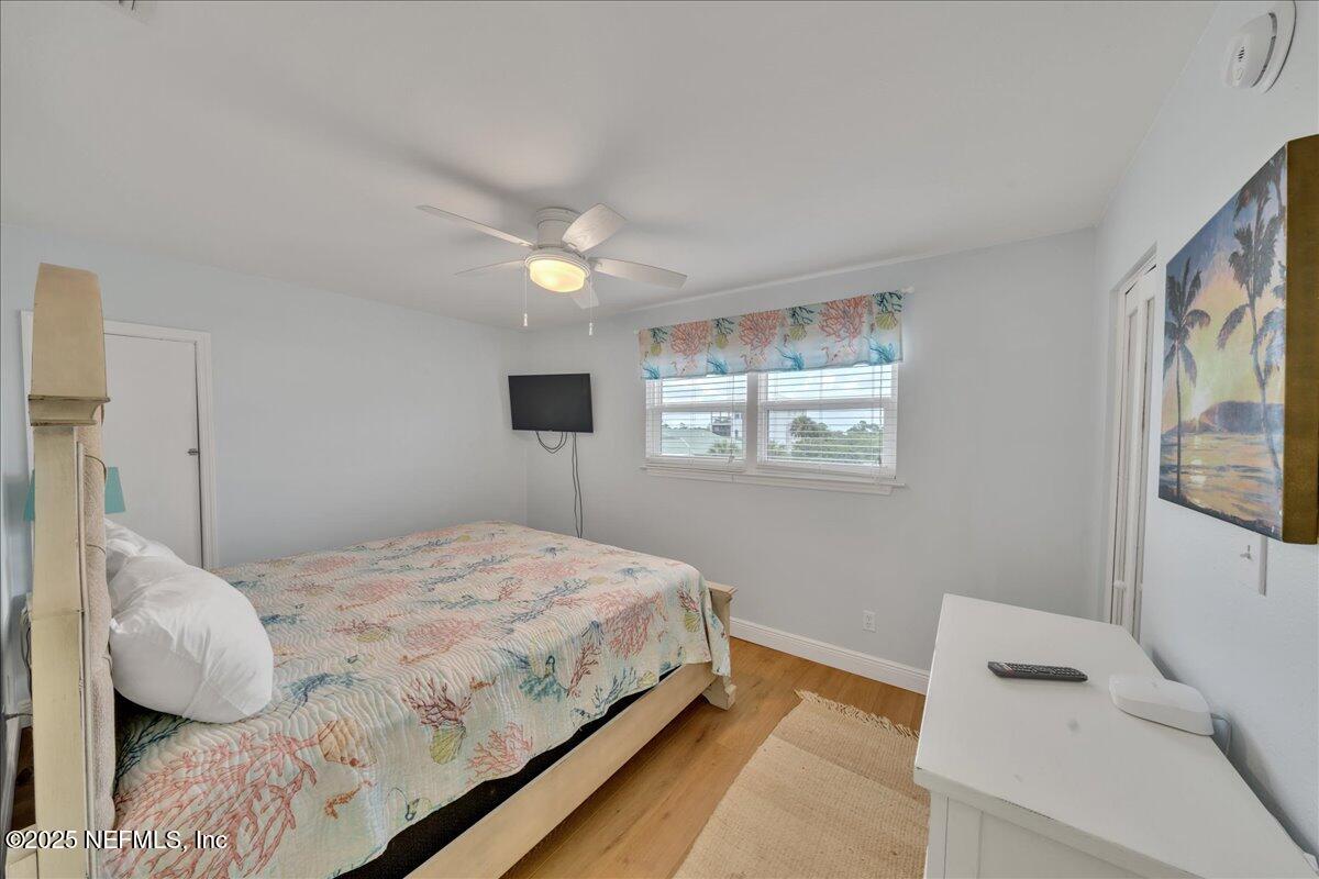 4491 Surfside Lane Port St. Joe, FL 32456 - Photo 36 of 84 a bedroom with a bed and a window