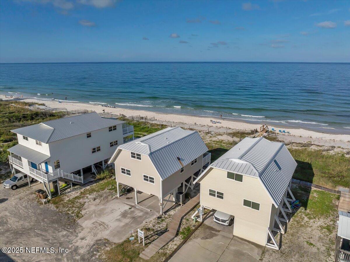 4491 Surfside Lane Port St. Joe, FL 32456 - Photo 63 of 84 an aerial view of a house with a yard