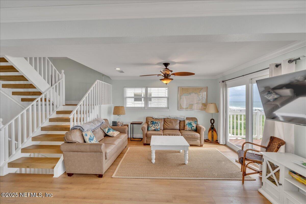 4491 Surfside Lane Port St. Joe, FL 32456 - Photo 7 of 84 a living room with furniture and a large window