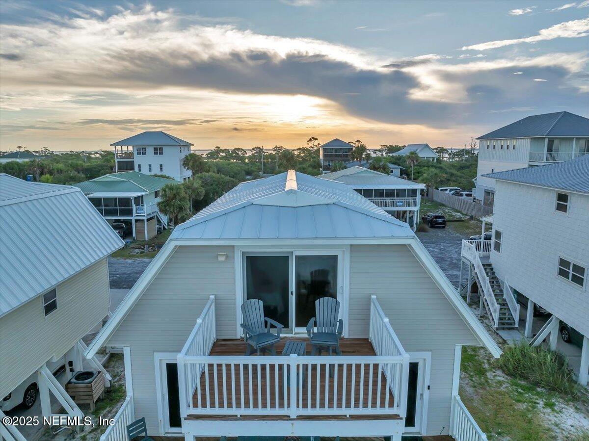 4491 Surfside Lane Port St. Joe, FL 32456 - Photo 71 of 84 a aerial view of a house with a balcony