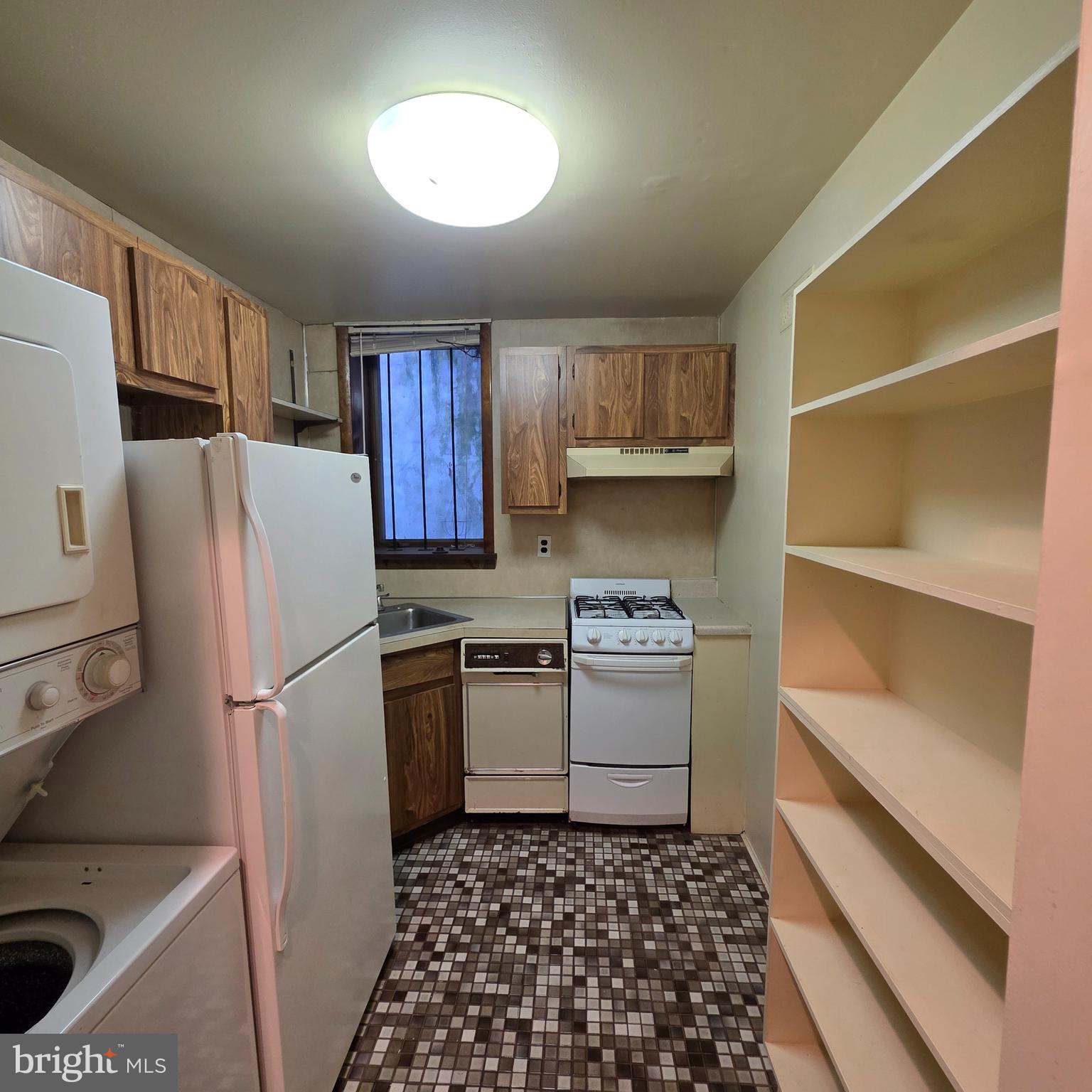 740 East Passyunk Avenue, Unit A Philadelphia, PA 19147 - Photo 13 of 20 a kitchen with a refrigerator sink and stove