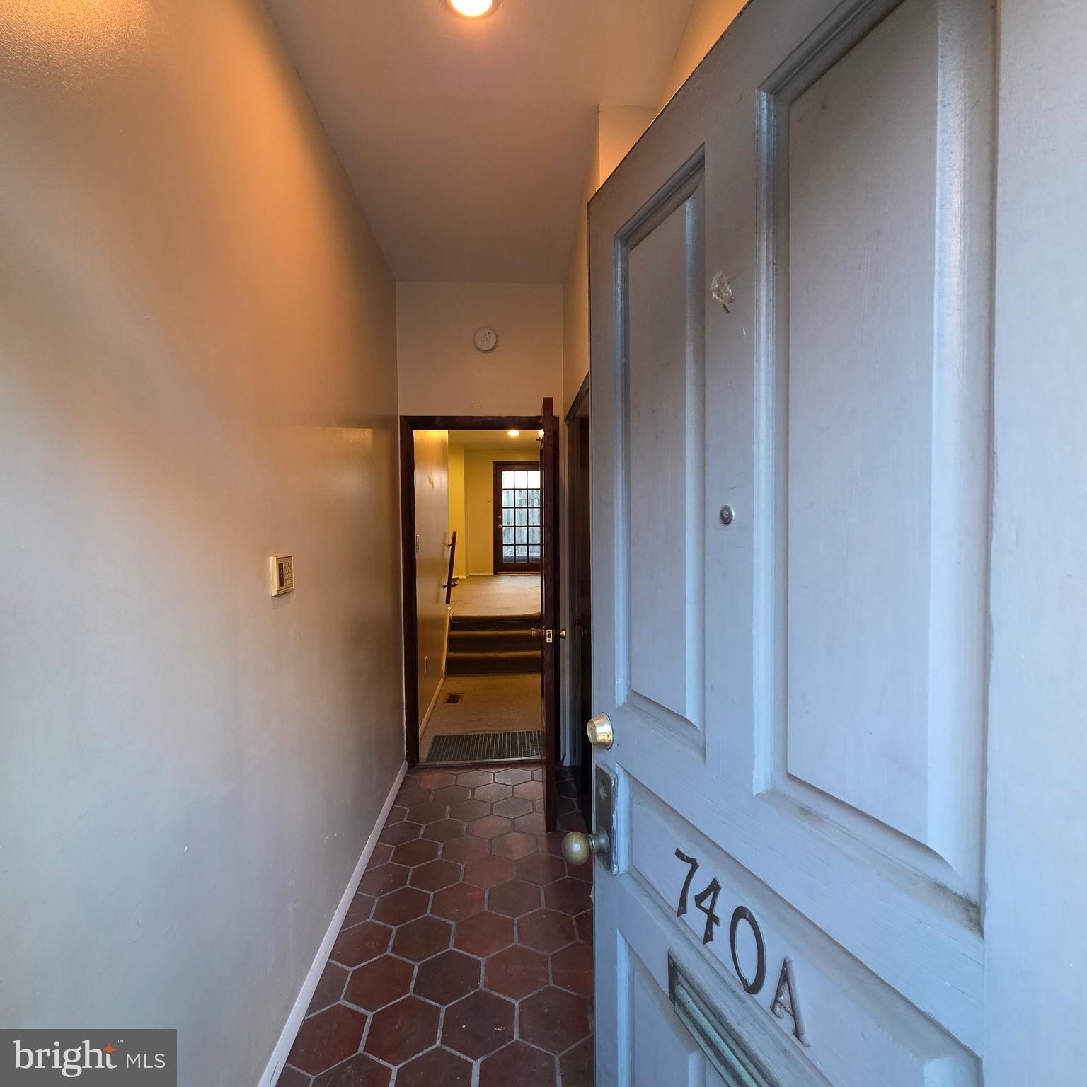 740 East Passyunk Avenue, Unit A Philadelphia, PA 19147 - Photo 3 of 20 a view of a hallway with wooden floor and closet