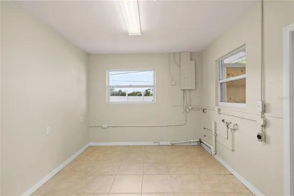 en empty room with windows