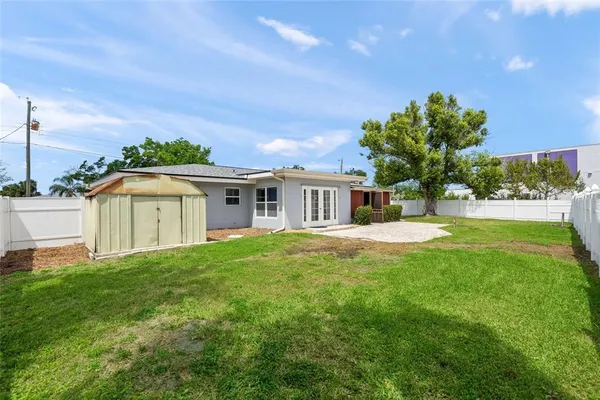 a view of a house with a garden