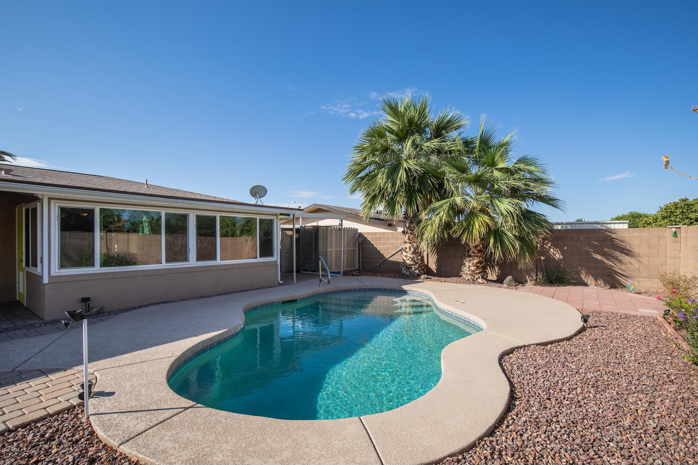 5320 East Decatur Street Mesa, AZ 85205 - Photo 29 of 34 a view of a house with swimming pool