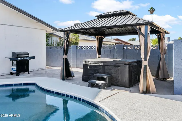a dining room with furniture and a fireplace