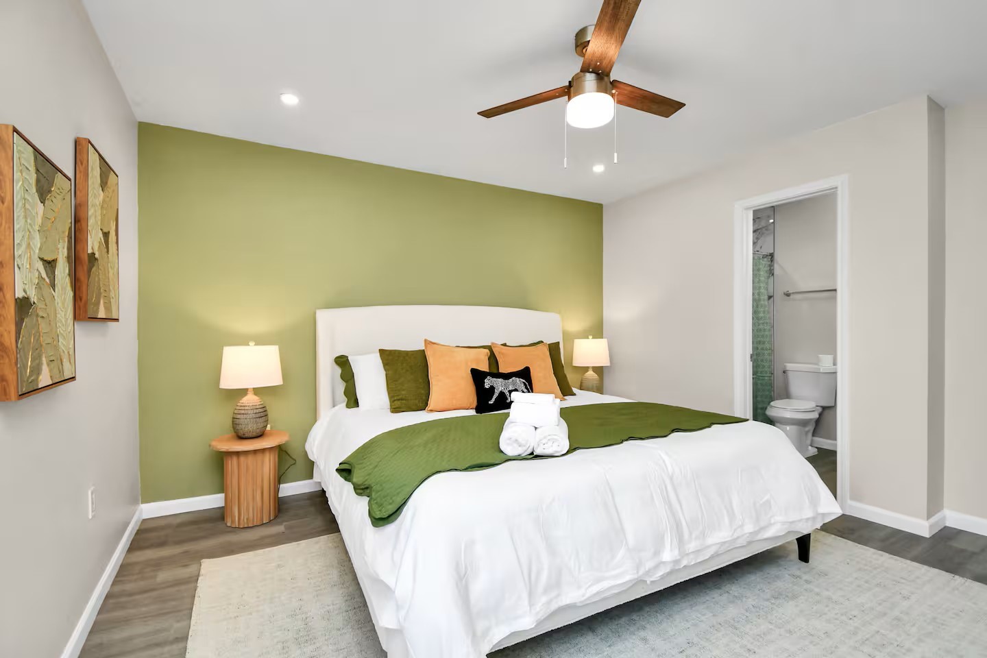 3318 Wichita Street Houston, TX 77004 - Photo 26 of 36 a bedroom with a bed and a chandelier