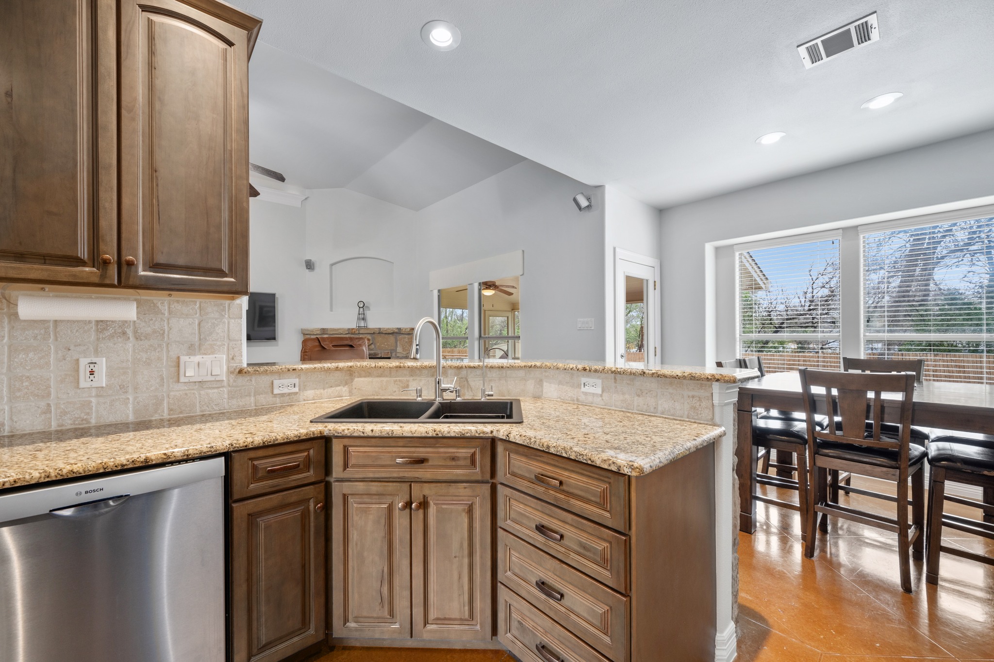 531 Leanna Oaks Loop Manchaca, TX 78652 - Photo 11 of 30 Kitchen looks into breakfast room and living space
