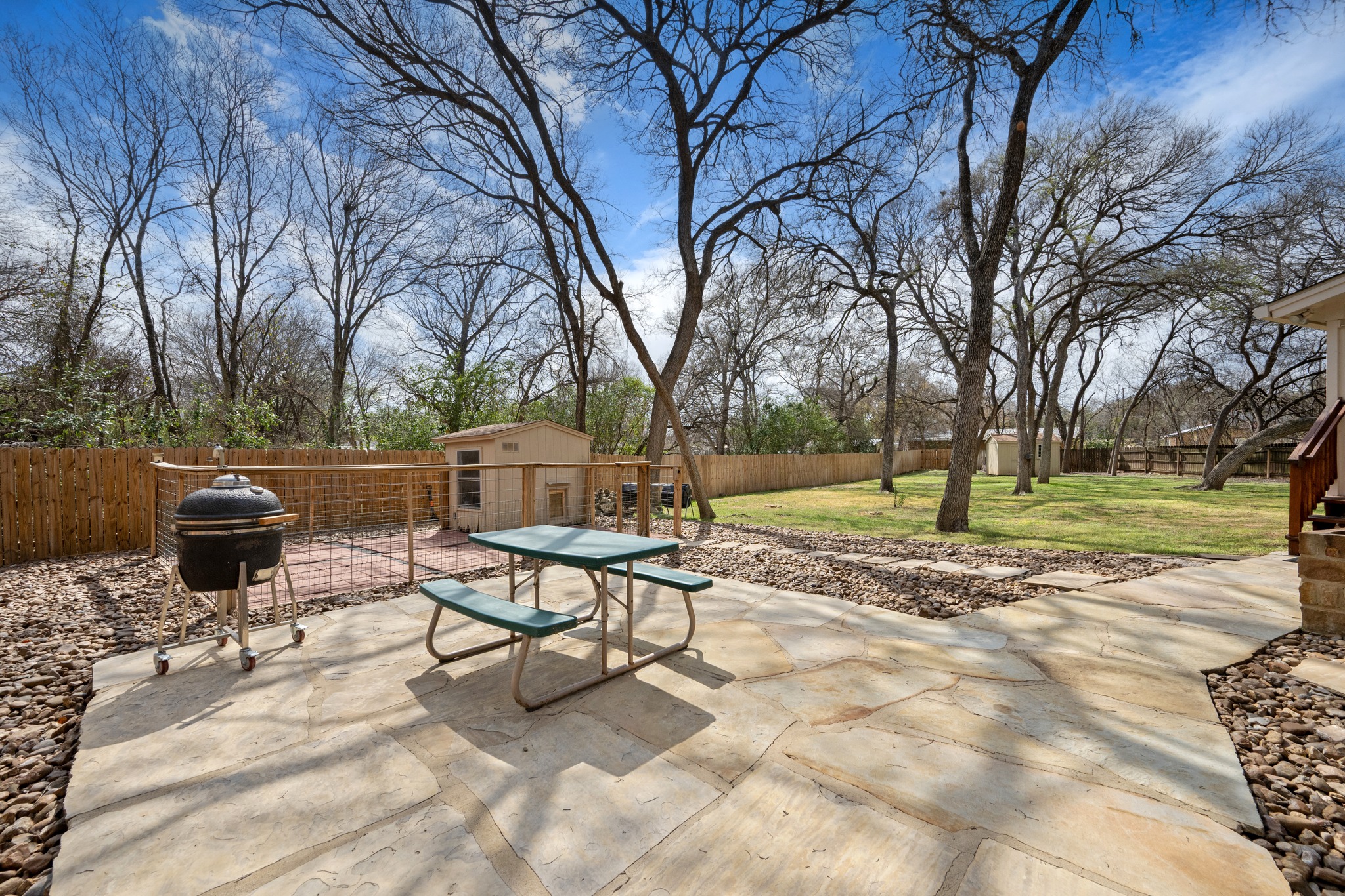 531 Leanna Oaks Loop Manchaca, TX 78652 - Photo 27 of 30 Stone patio looks out to the yard