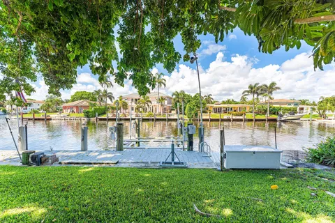 a view of swimming pool with a lake view