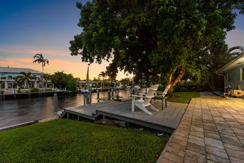 a view of a lake with sitting area